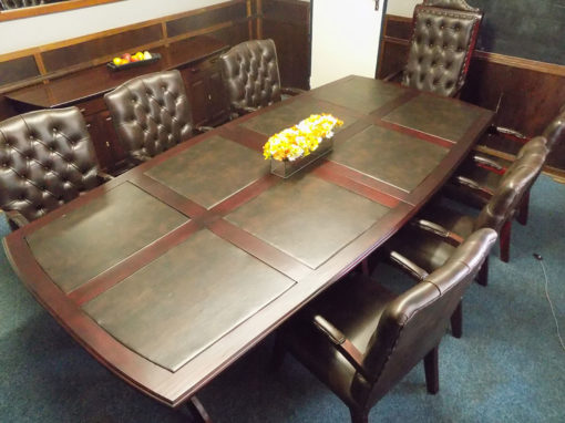 Boardroom table with leather inlay